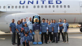 Plane pull photograph of hudson employees 