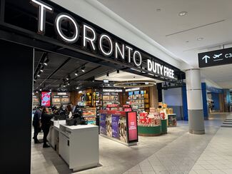 Exterior of an airport store showing a variety of items sold