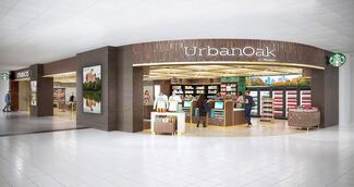 A retail store in an airport with an adjoining coffee shop