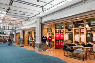 A photo looking into a new apparel store selling tshirts, sweatshirts, hats, and more.